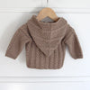 

Gilet à torsades avec capuche - Baby
4