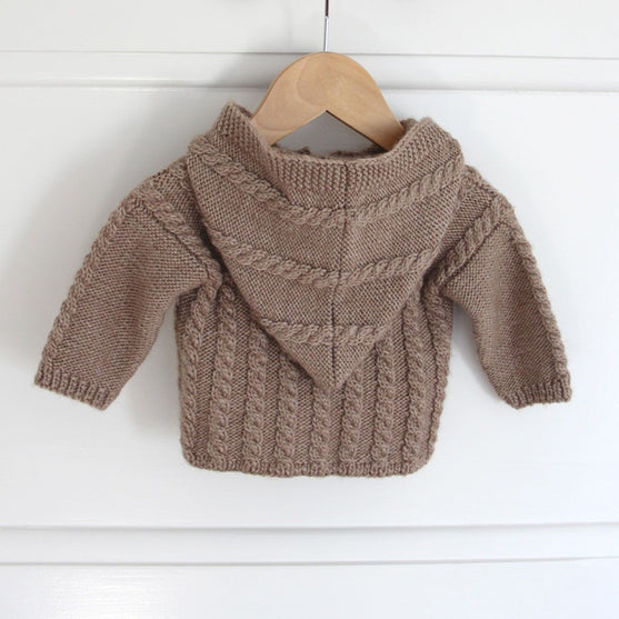 

Gilet à torsades avec capuche - Baby
4
