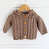 

Gilet à torsades avec capuche - Baby
3