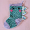 

Chaussette de Noël Dino
2