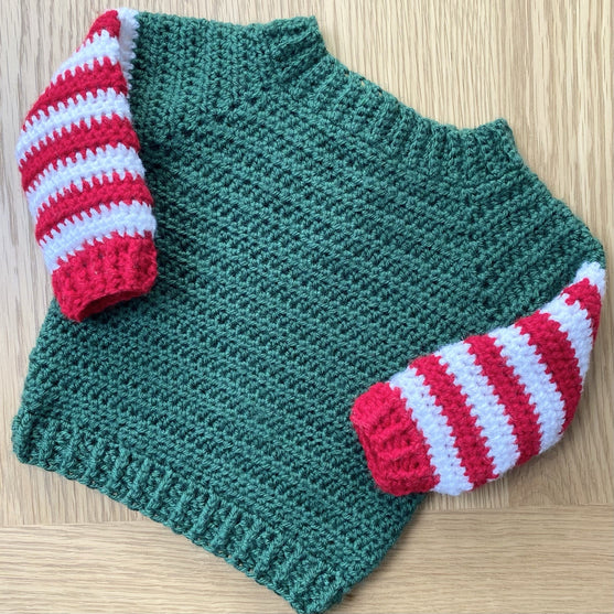 

Baby Elf - Pull et Bonnet de Noël
5