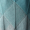 

Emerald - Châle Domino
4