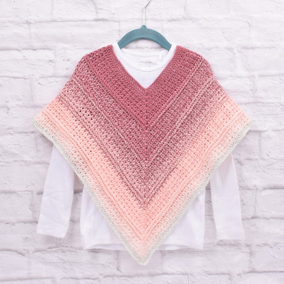 

Poncho Enfant Timeless – Twister
5