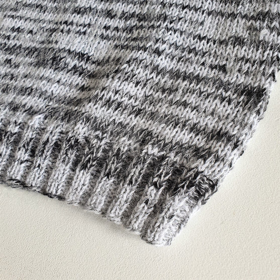 

Jane - Pull sans manches
4